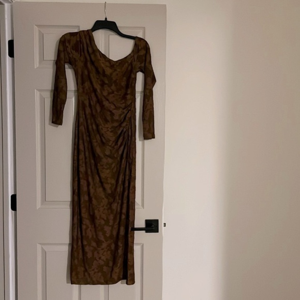Never worn! Bought in the wrong size and was too late in returning. Brand new!